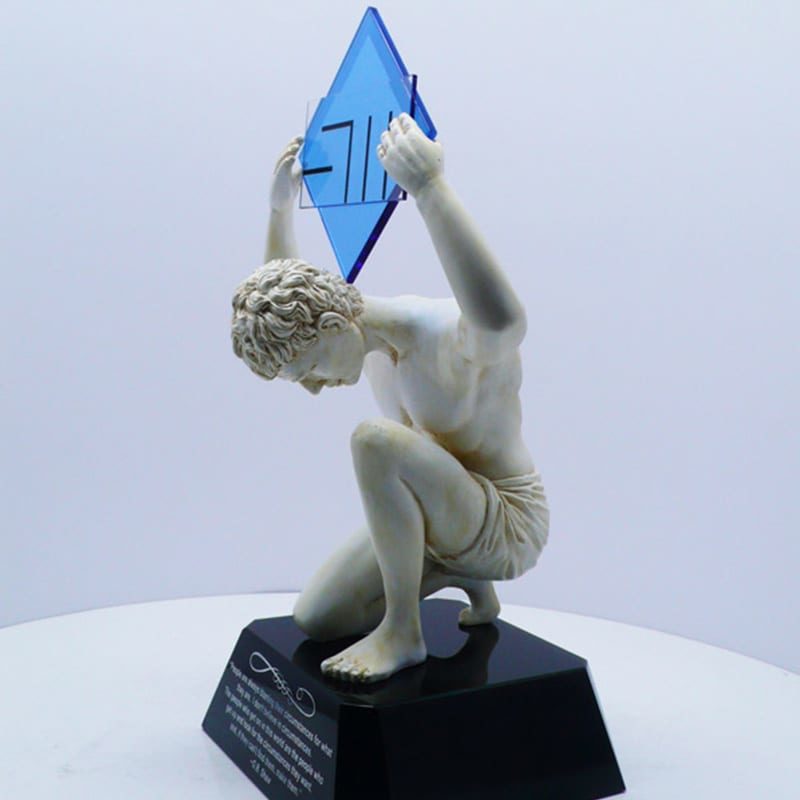 White Marble Statue Award Of Man Holding Blue Crystal With Black Base