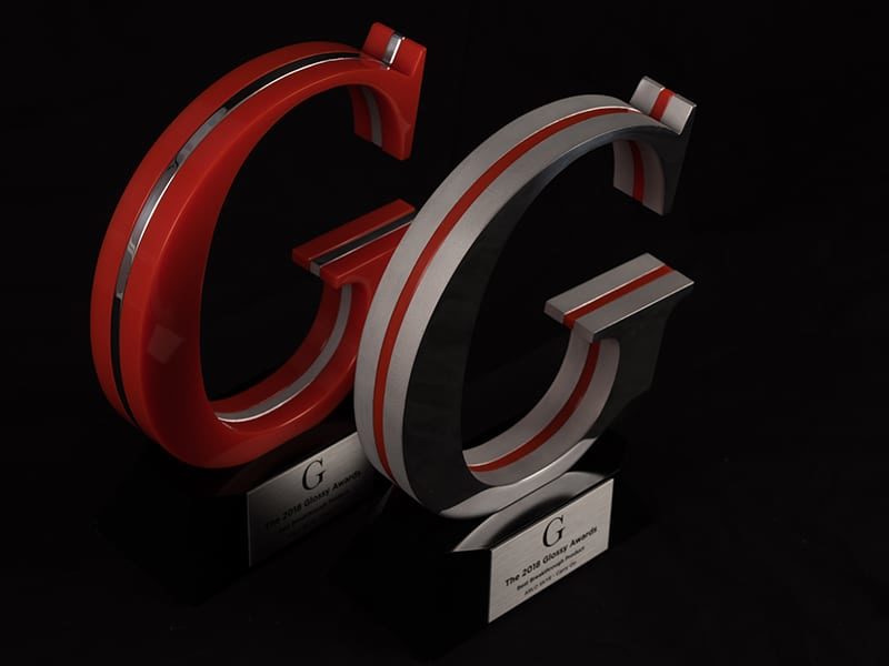 Red And Gray Acrylic And Metal Awards Of Company Logo