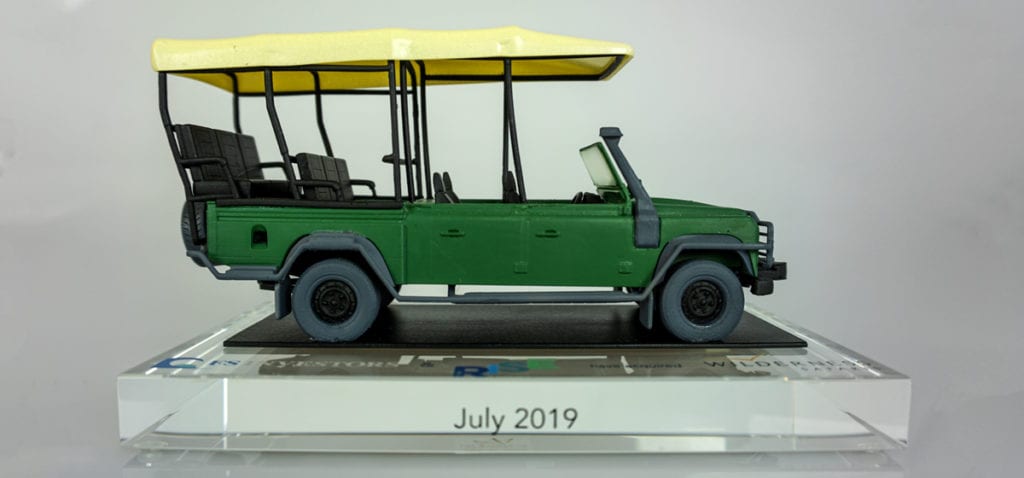 3D-Printed Safari Truck Deal Toy On Clear Crystal Base