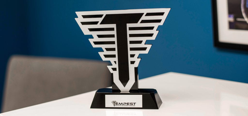 Black And Silver Award In Shape Of T Made Of Metal And Acrylic