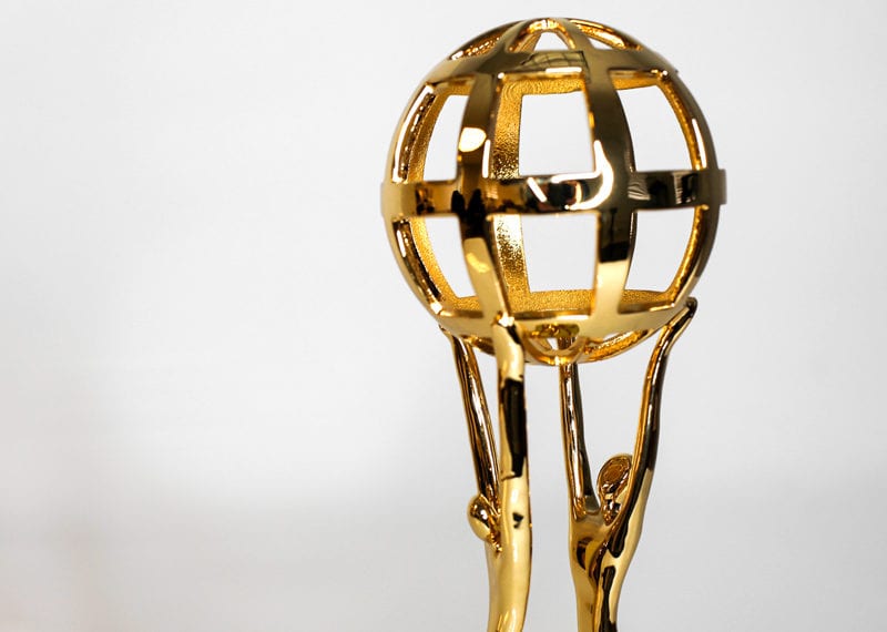 Gold Awards Figures Holding Globe Statue