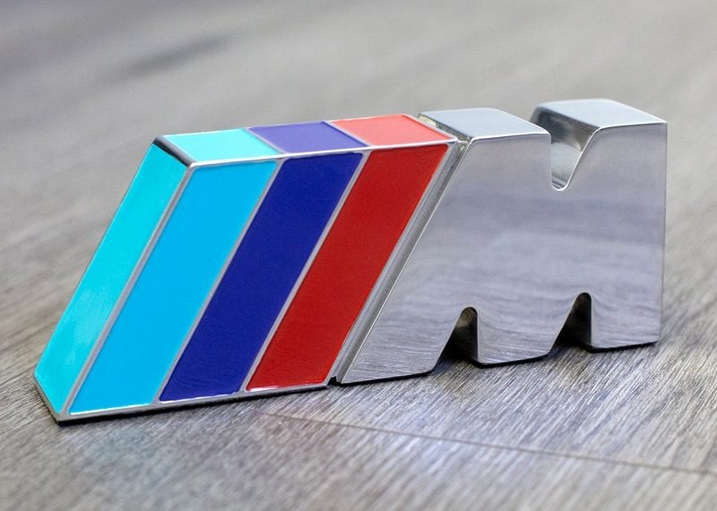 EDM Wire cut Metal BMW logo replica with color enamel fill