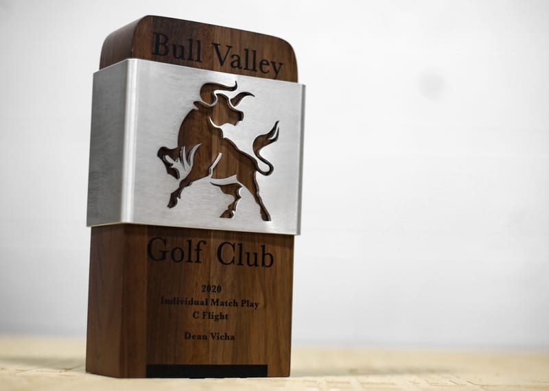 Wood custom trophy with digital print personalization. Metal bull cutout wrapped around the wood