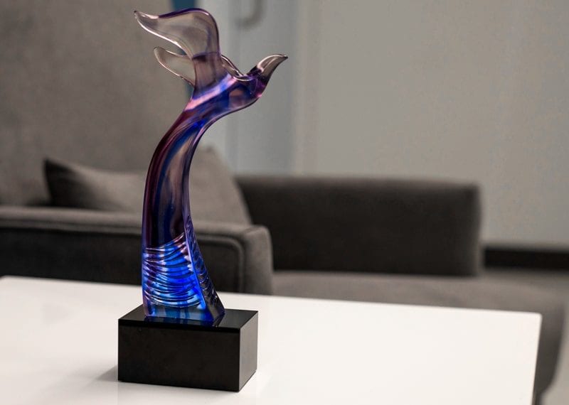 dove award statue with pate de verre color decoration method