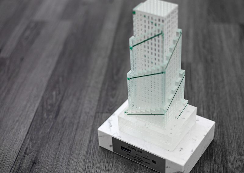 Crystal building replica deal toy on marble base