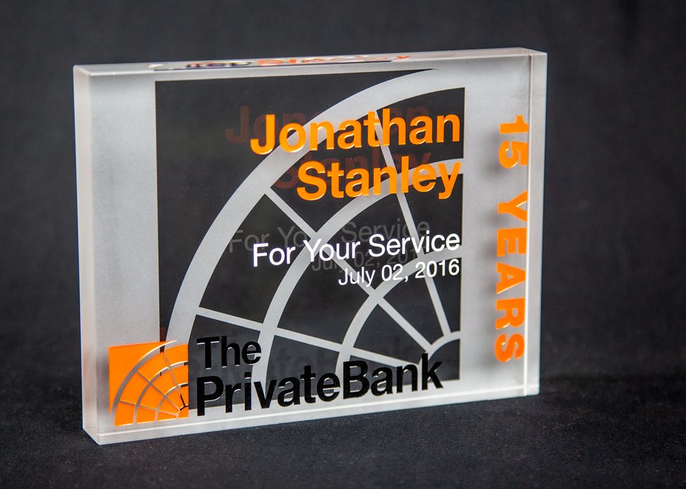 Crystal service award reverse sand etch on backside. Sand etch and color fill on frontside