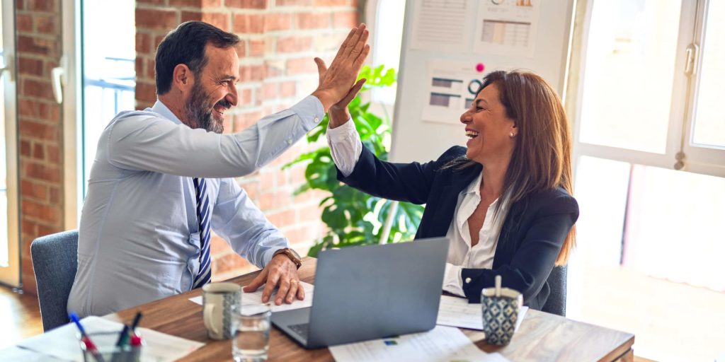 Happy employees teamwork in office