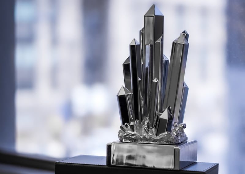 Metal crystals coming out of ground custom smithsonian award