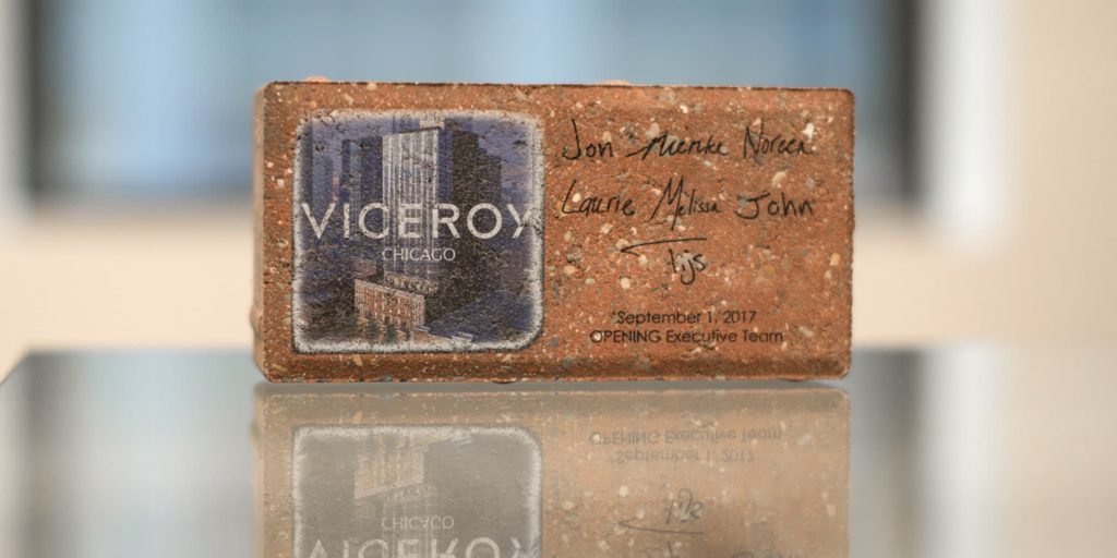 Construction brick with personalization printed on frontside