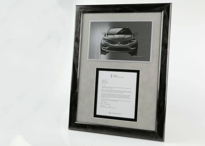 Lacquer finished, wood frame with document and photo insert.