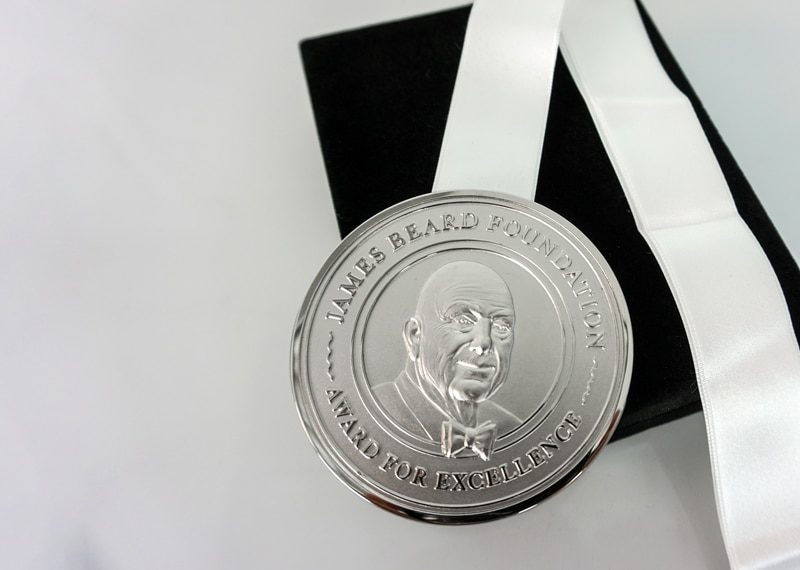 Silver diestamped medallion milestone award