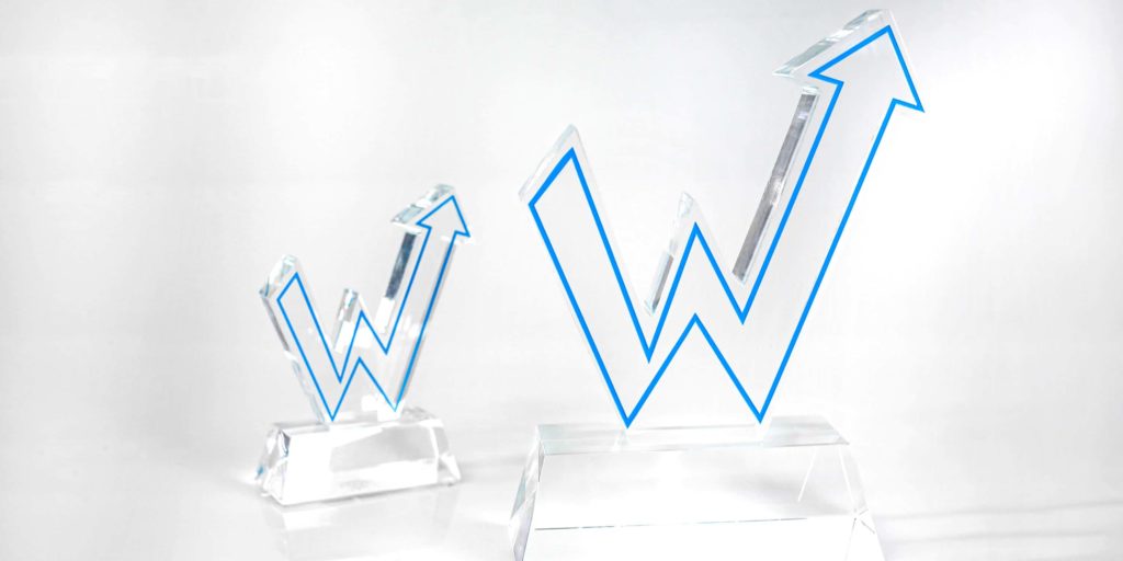 Optical crystal waterjet cut into W logo