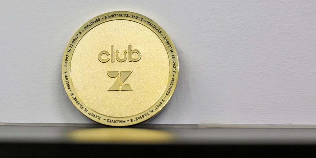 golden medallion with location engraving
