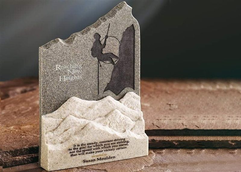 Stone trophy with ridged cuts and sand etch personalization