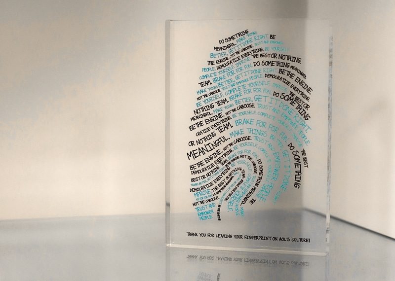 Acrylic stock block with digital print thumbprint design with company values written