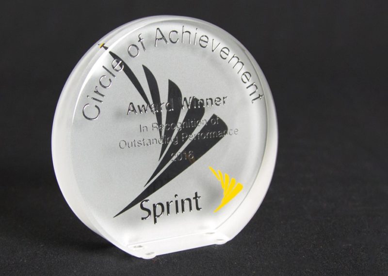 Crystal circle of achievement award. Frosted backside