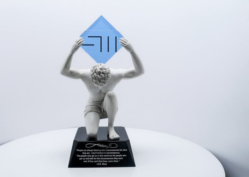 Atlas sculpture holding crystal personalized