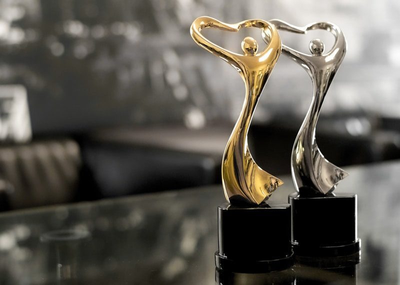 Heart figure metal award sculpture gold an silver