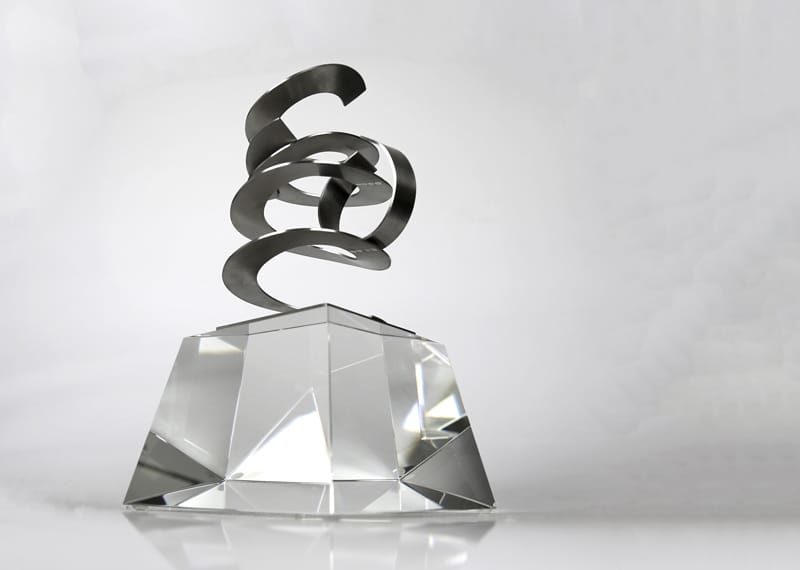 Meta abstrac sculpture on crystal base