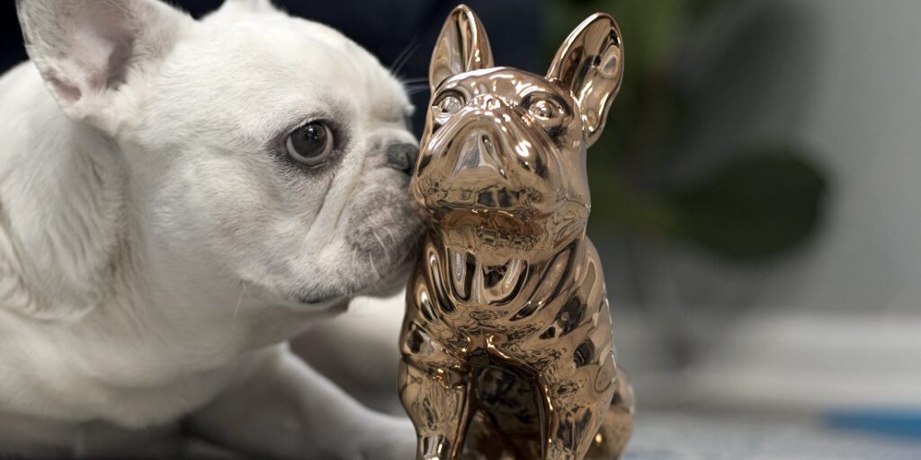 Company dog with replica trophy